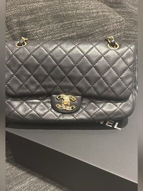 CHANEL Black Quilted Leather Shoulder Bag with Gold Hardware